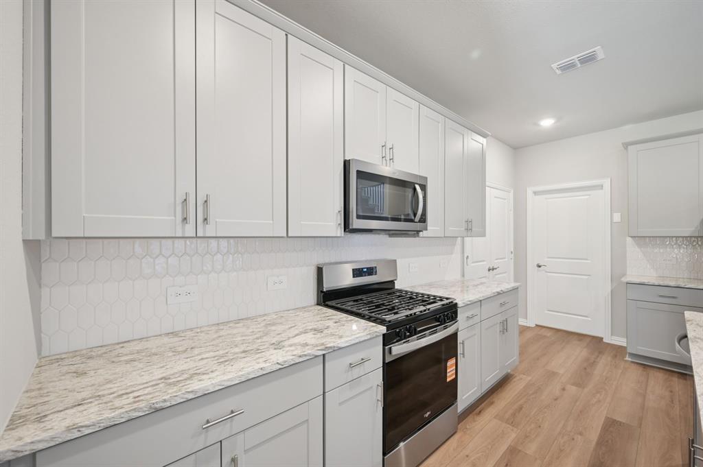 1628 Arches Road Anna, TX 75409 - Photo 5 of 28 Photo is not of the actual home, but is an inspirational photo of builder’s model home and may depict options, furnishings, and/or decorator features that are not included.