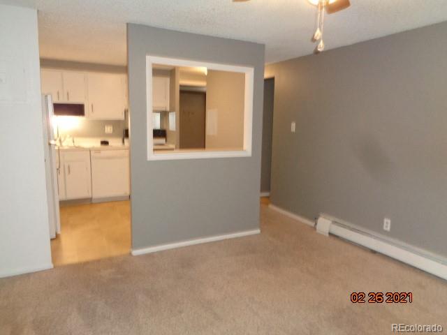 1300 South Parker Road, Unit 112 Denver, CO 80231 - Photo 4 of 15 a view of an empty room