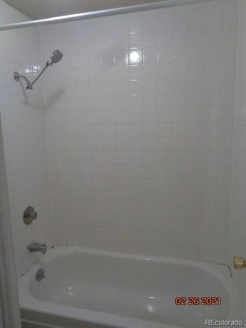 1300 South Parker Road, Unit 112 Denver, CO 80231 - Photo 6 of 15 a close up of a bathtub