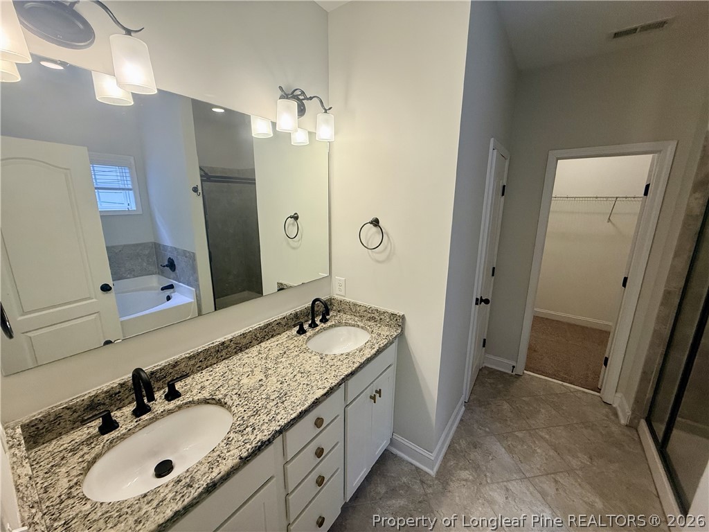 1234 Micahs Way North Spring Lake, NC 28390 - Photo 12 of 32 primary bath