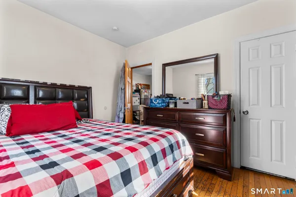 a room with furniture and wooden floor