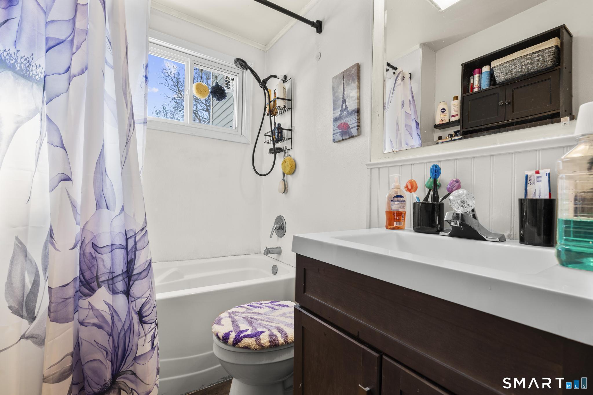 17 Austin Street New Britain, CT 06051 - Photo 24 of 40 a bathroom with a sink a bath tub and a shower