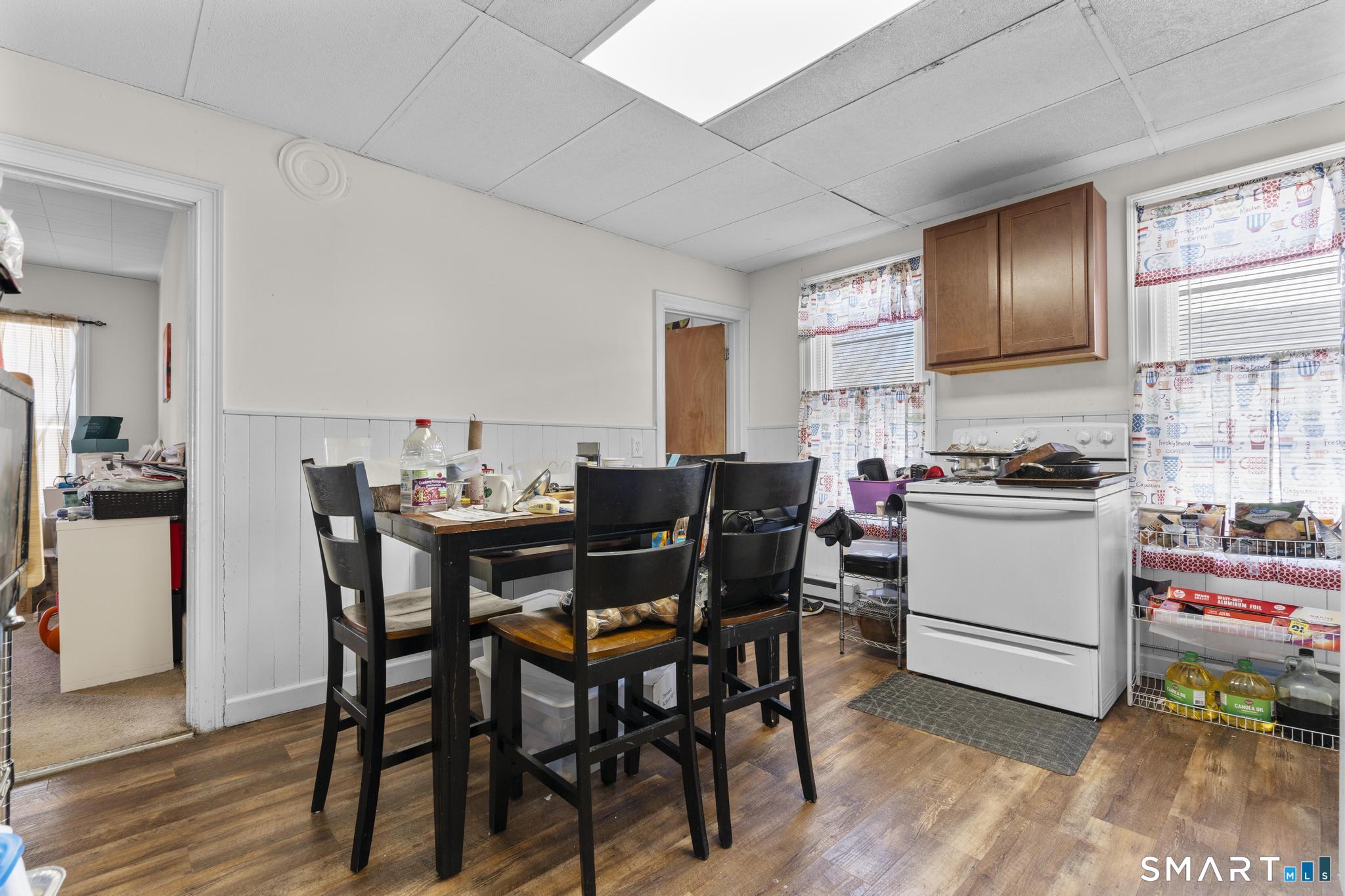 17 Austin Street New Britain, CT 06051 - Photo 28 of 40 a view of a dining room with furniture and wooden floor