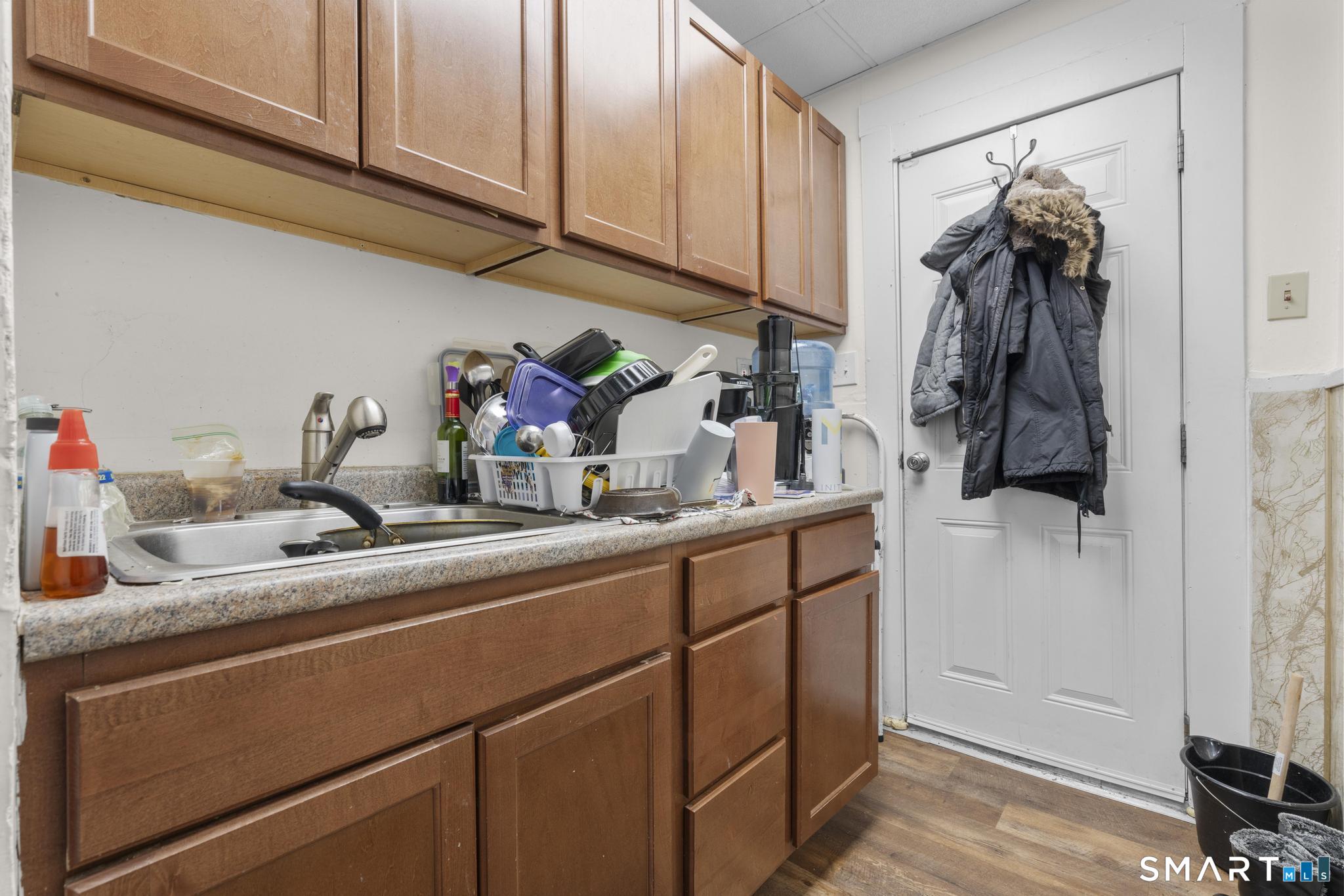 17 Austin Street New Britain, CT 06051 - Photo 30 of 40 a kitchen with a sink and cabinets