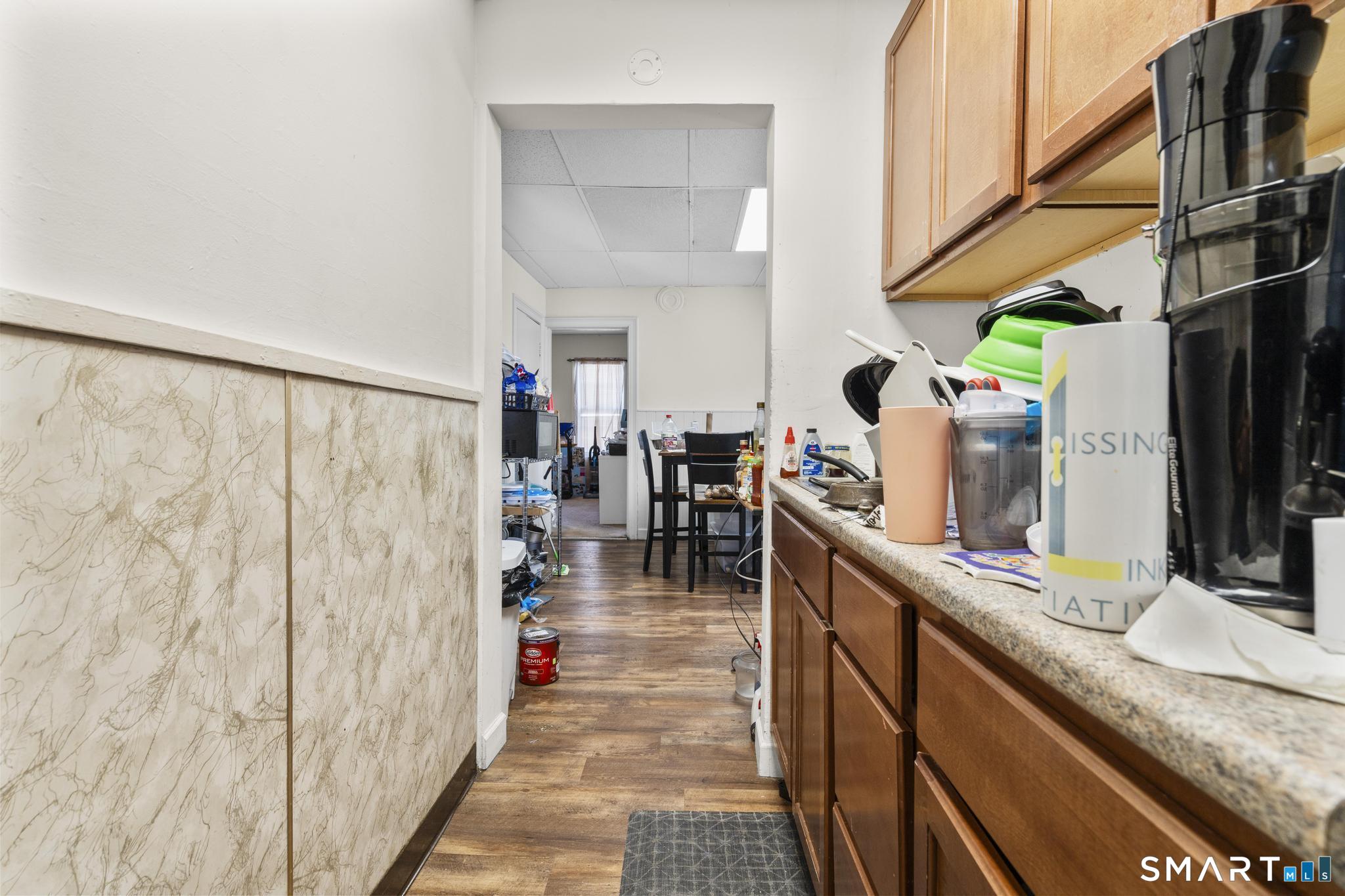 17 Austin Street New Britain, CT 06051 - Photo 31 of 40 a kitchen with stainless steel appliances granite countertop a refrigerator and a sink
