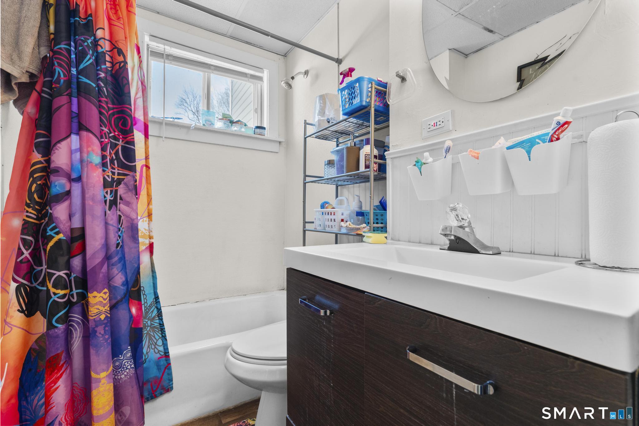 17 Austin Street New Britain, CT 06051 - Photo 33 of 40 a bathroom with a sink toilet and shower