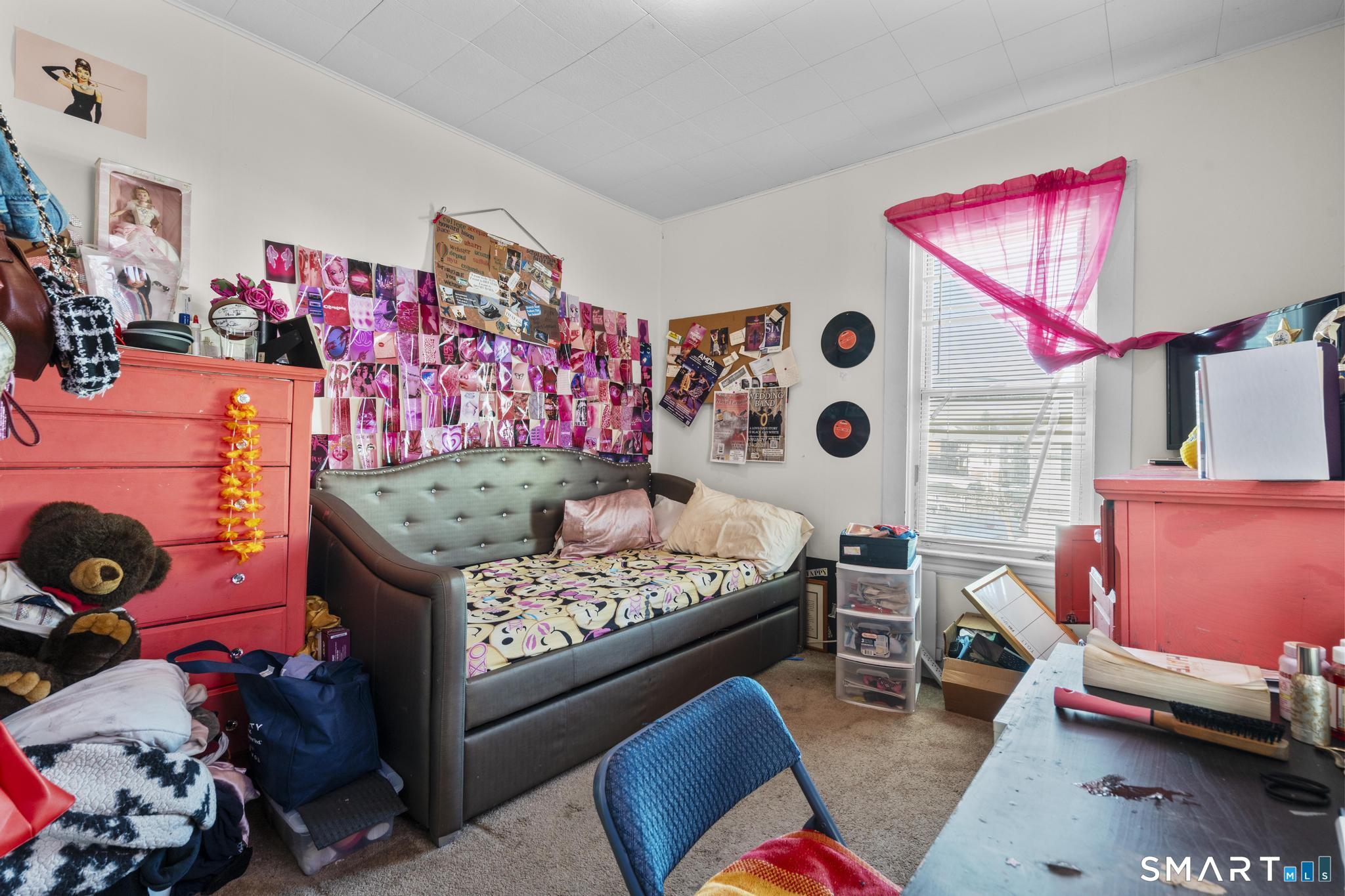 17 Austin Street New Britain, CT 06051 - Photo 34 of 40 a bedroom with a bed and a window