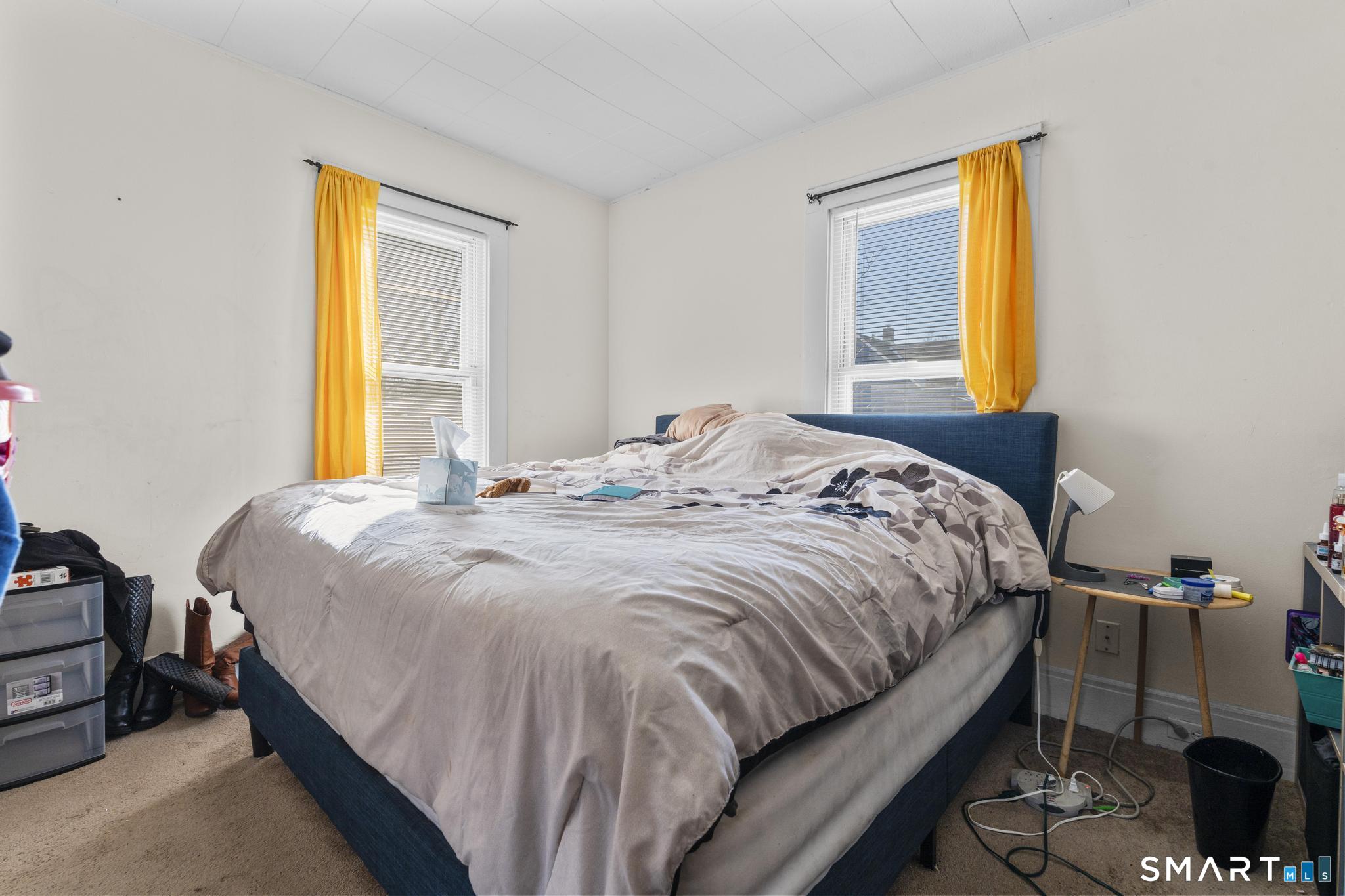 17 Austin Street New Britain, CT 06051 - Photo 37 of 40 a bedroom with a bed and a window