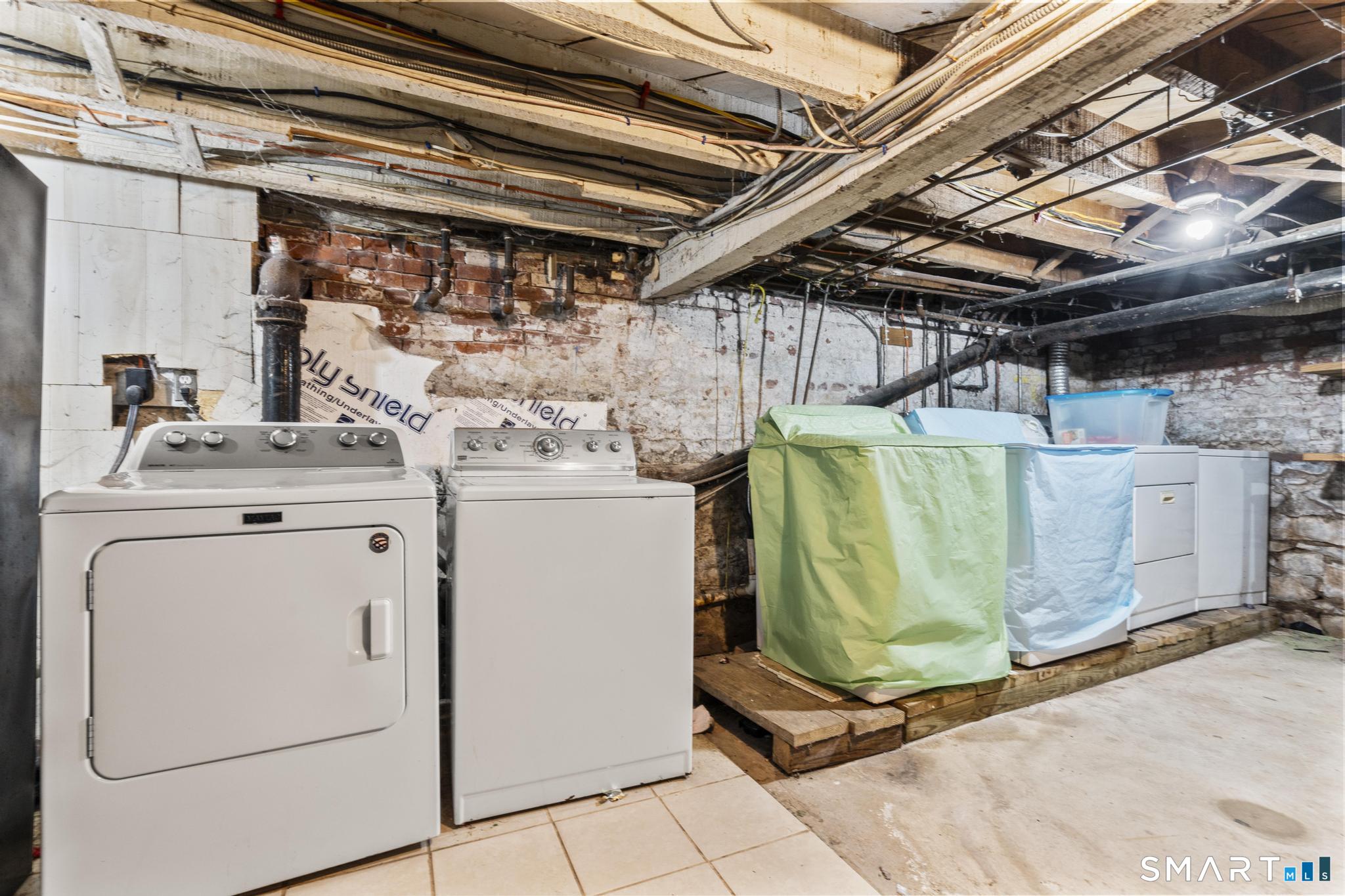 17 Austin Street New Britain, CT 06051 - Photo 40 of 40 a utility room with dryer and washer