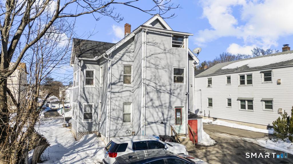 17 Austin Street New Britain, CT 06051 - Photo 9 of 40 a front view of a house with a yard