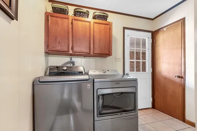 a kitchen with granite countertop a sink and a stove top oven