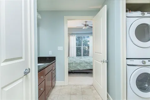 a view of a hallway with washer and dryer