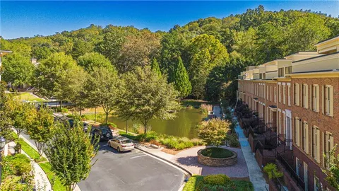 a view of a pathway with a yard