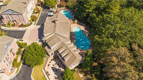 an aerial view of a house with a garden