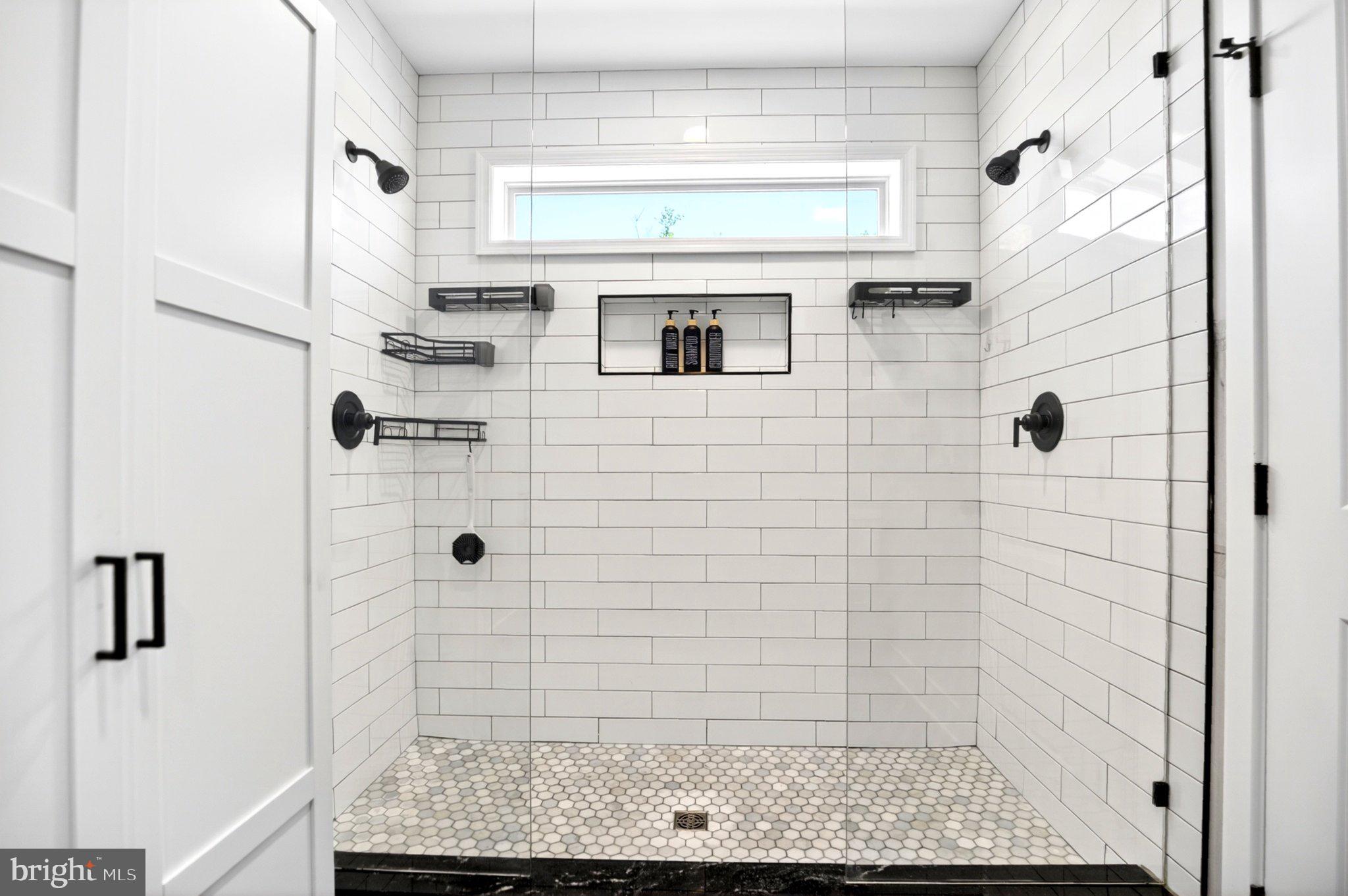 25015 Mt Pleasant Road Columbus, NJ 08022 - Photo 16 of 59 Sleek modern shower with elegant tiles.