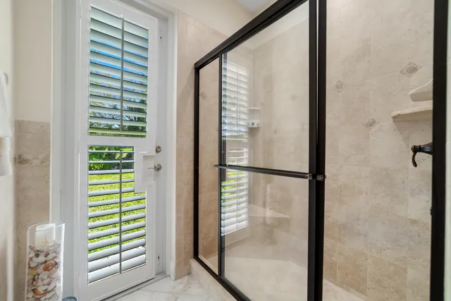 a bedroom with a bed and cabinets