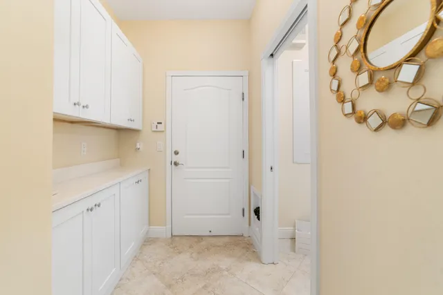 a bedroom with a bed and a chair