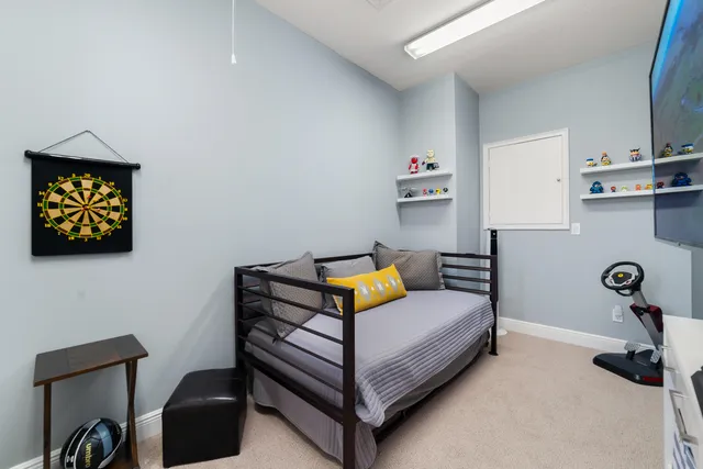 a living room with furniture fireplace and flat screen tv