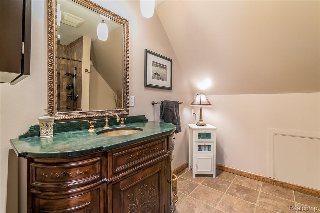 277 North Baldwin Road Oxford, MI 48371 - Photo 28 of 45 2ND MASTER BATHROOM - TILED FLOORS UPGRADED VANITY