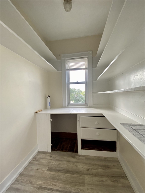 14 Belknap Street, Unit 3 Somerville, MA 02144 - Photo 5 of 25 a room with a bed and a window
