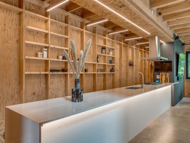 a view of a living room with a wooden floor