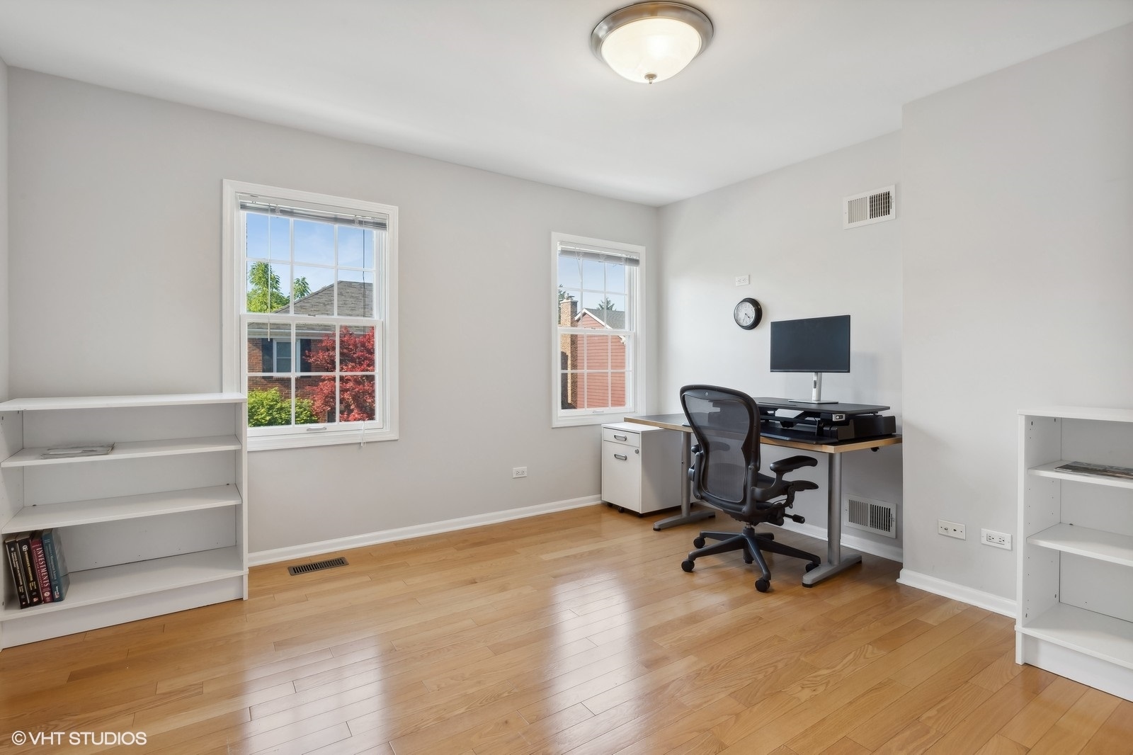2843 Farmington Road Northbrook, IL 60062 - Photo 16 of 28 a view of a workspace with furniture and a window