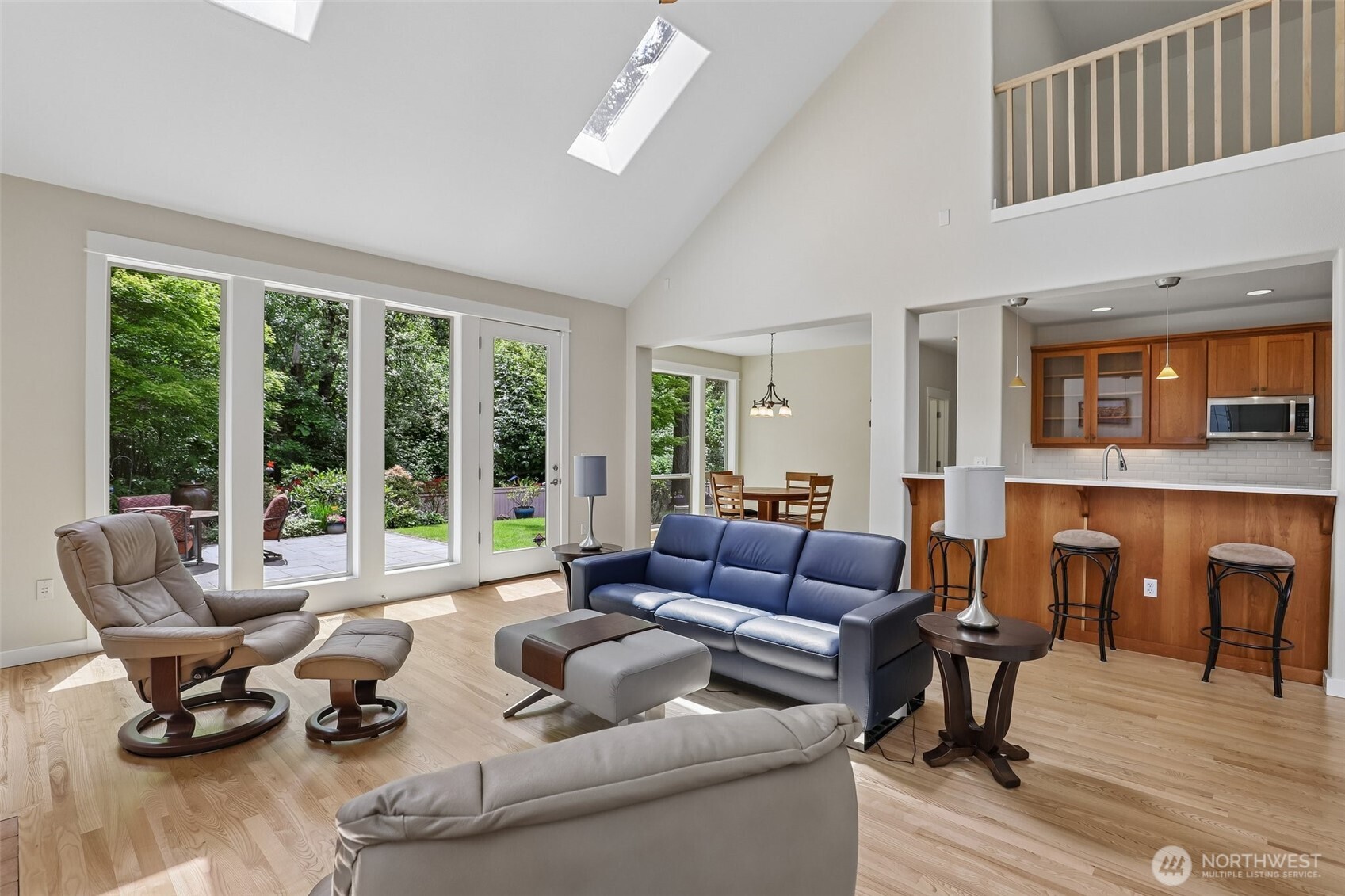19709 Southeast 26th Way Camas, WA 98607 - Photo 6 of 36 a living room with furniture and floor to ceiling windows
