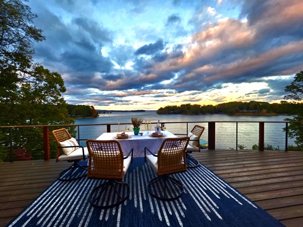 516 Hillandale Road Seneca, SC 29672 - Photo 13 of 50 Enjoy evening meals with expansive water views from this elevated deck.