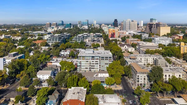 a view of a city with tall buildings