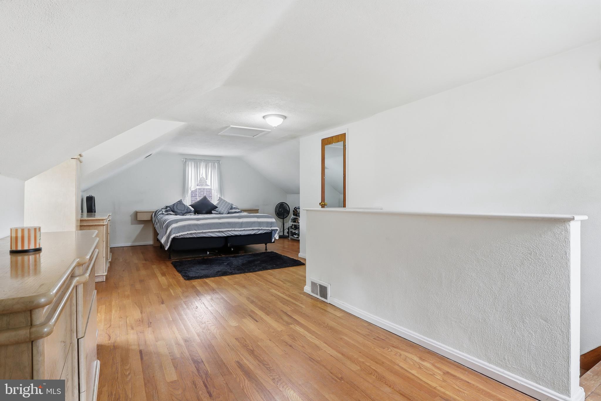 583 Hillcrest Road York, PA 17403 - Photo 15 of 44 a bedroom with furniture and a wooden floor