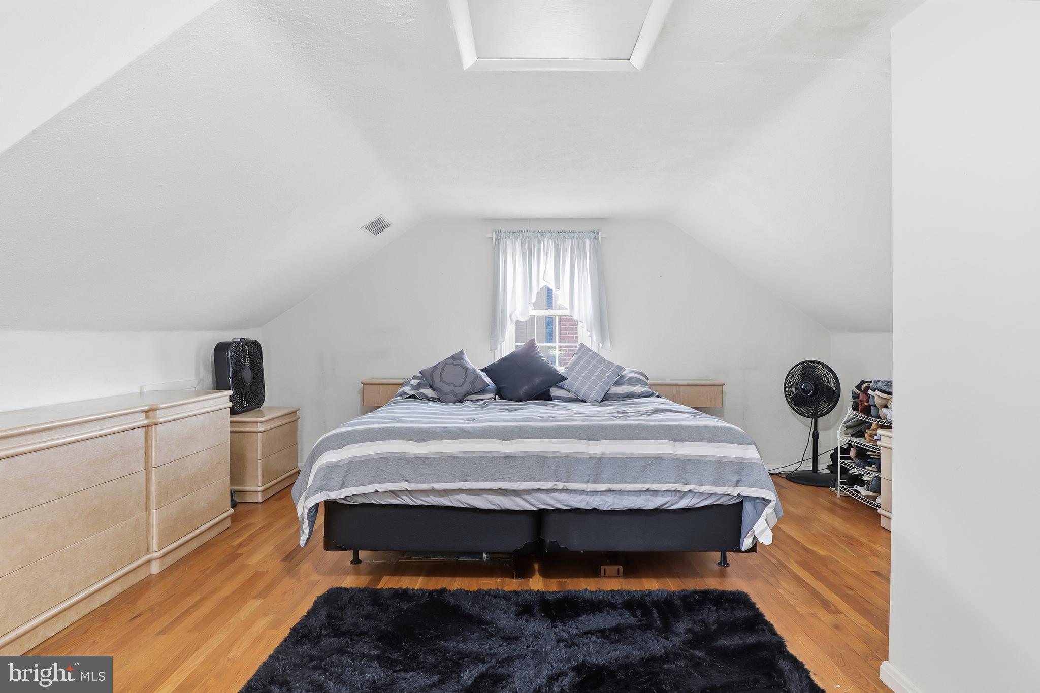 583 Hillcrest Road York, PA 17403 - Photo 16 of 44 a spacious bedroom with a bed and window