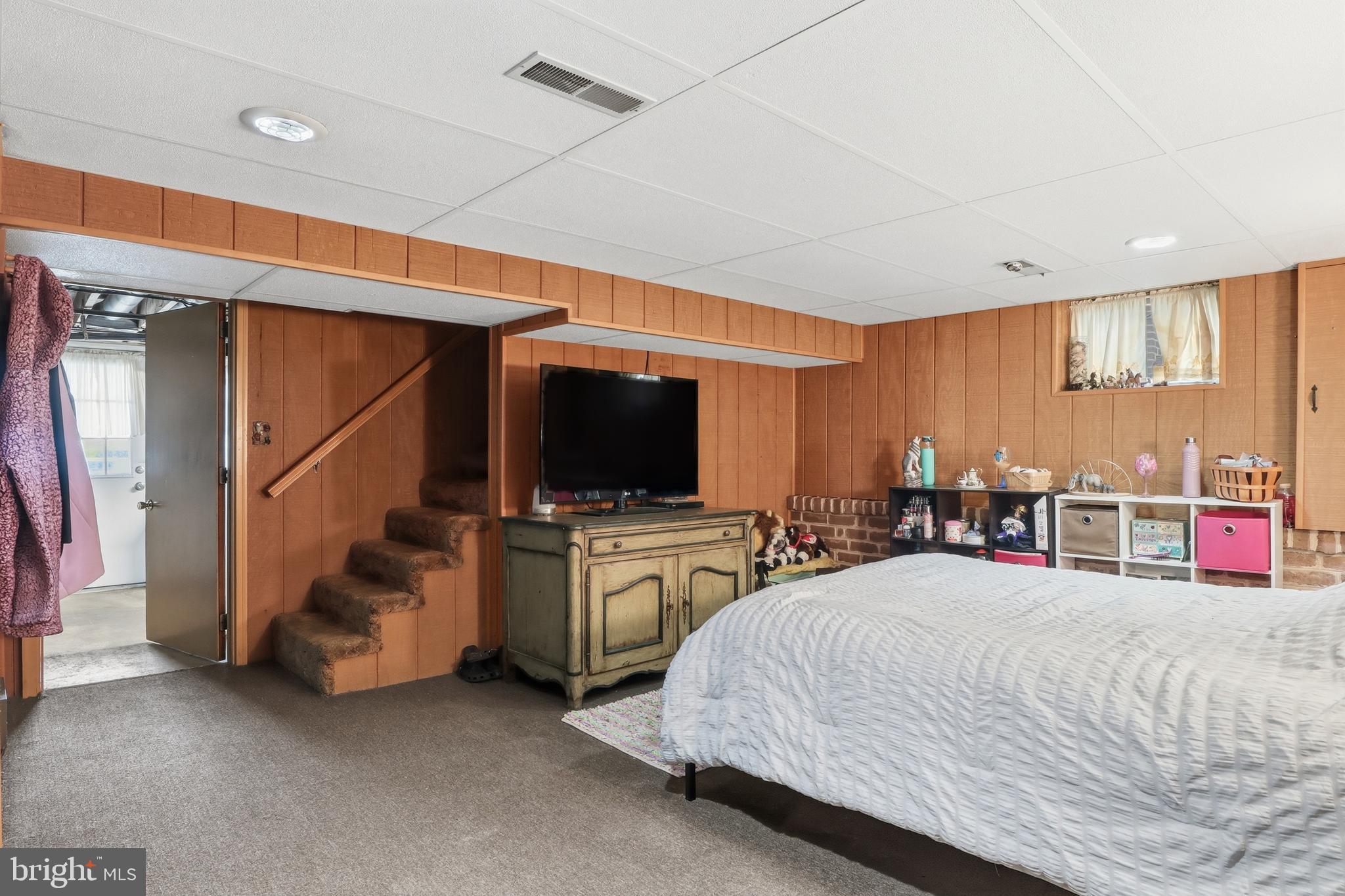 583 Hillcrest Road York, PA 17403 - Photo 20 of 44 a bedroom with furniture and a flat screen tv