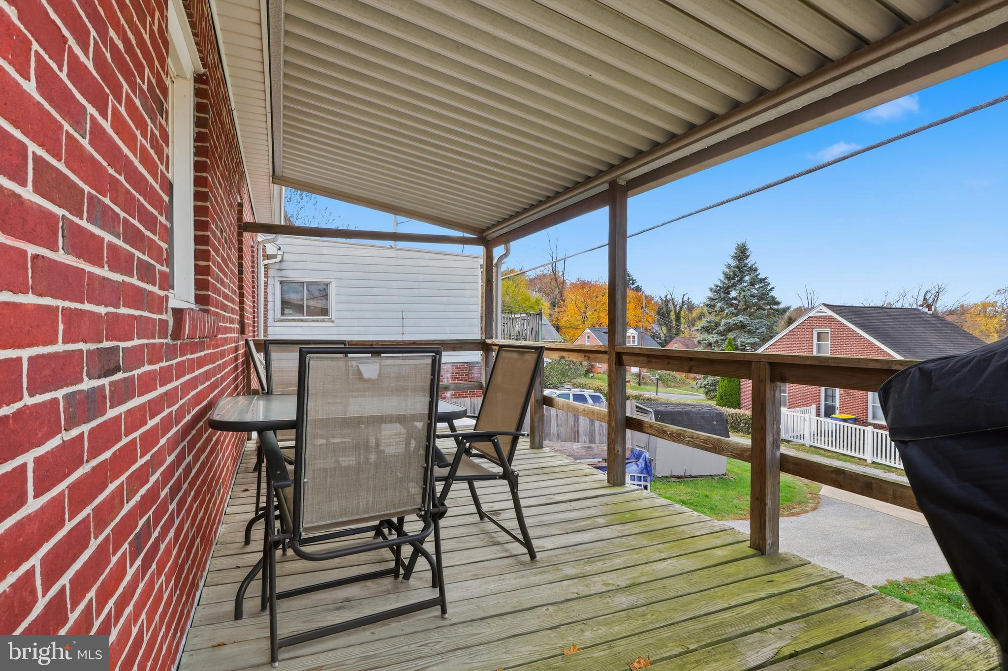 583 Hillcrest Road York, PA 17403 - Photo 24 of 44 a patio with wooden floor and outdoor seating