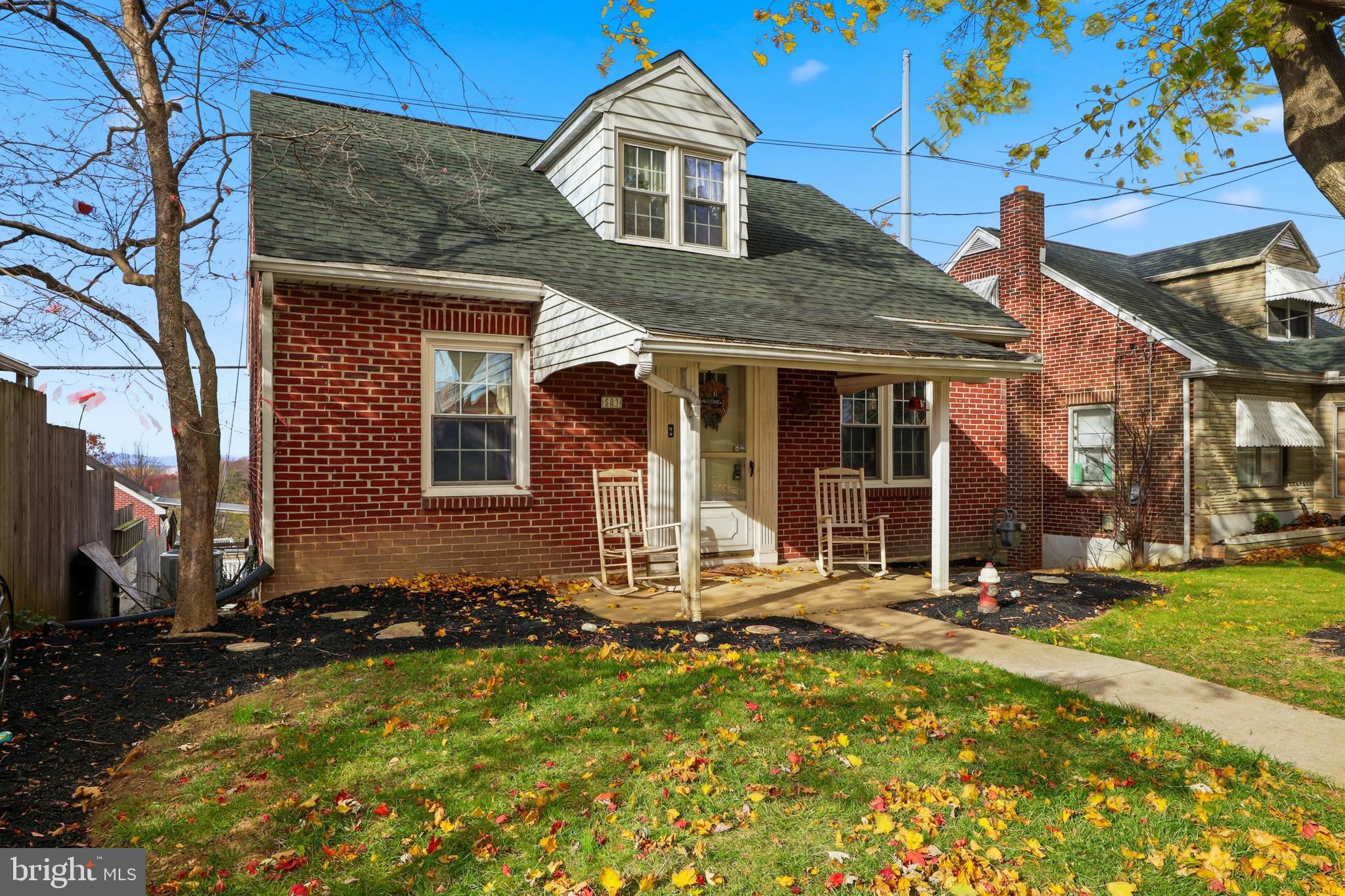 583 Hillcrest Road York, PA 17403 - Photo 26 of 44 a front view of a house with a yard