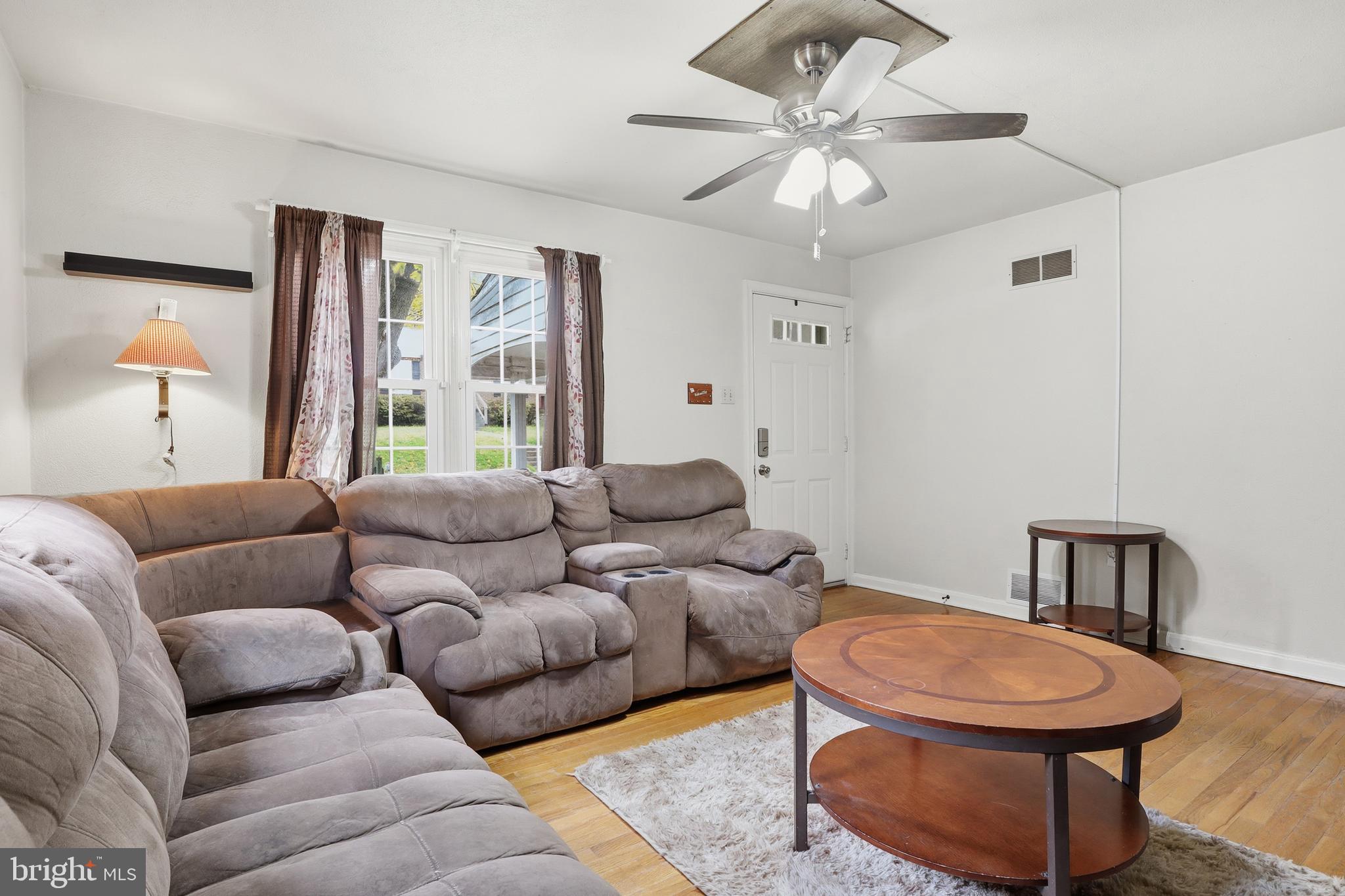 583 Hillcrest Road York, PA 17403 - Photo 5 of 44 a living room with furniture and a chandelier