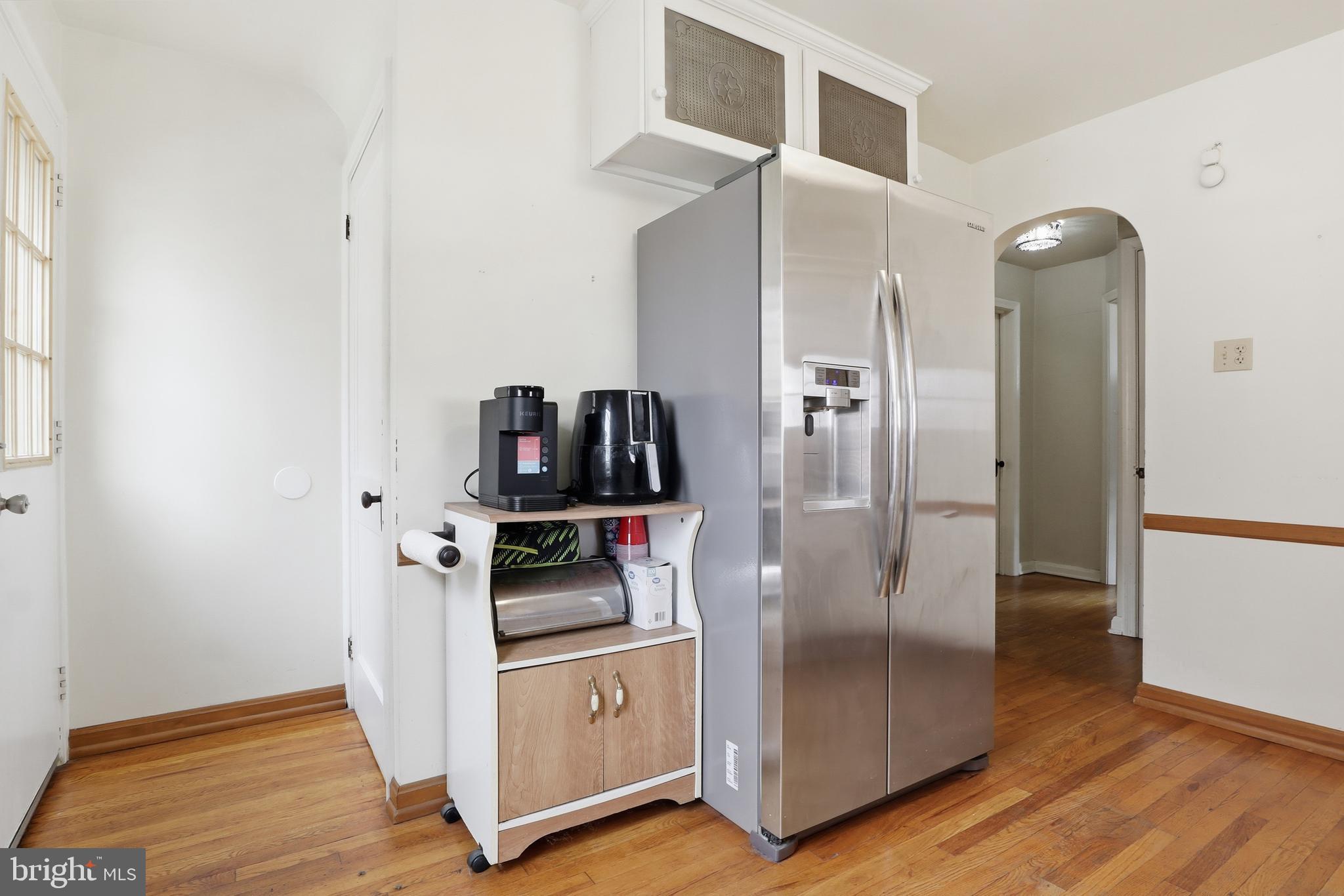 583 Hillcrest Road York, PA 17403 - Photo 8 of 44 a kitchen with stainless steel appliances a refrigerator and wooden floor