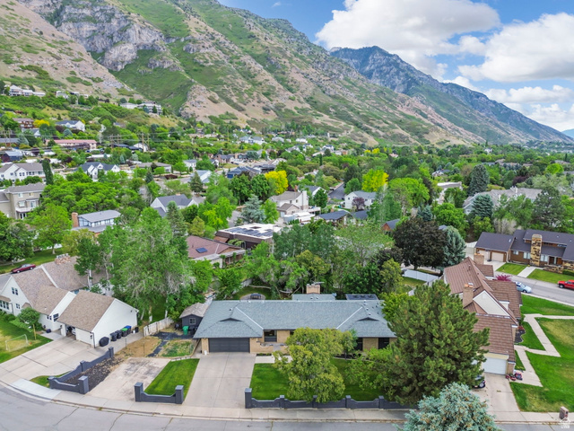 4150 Dover Lane Provo, UT 84604 - Photo 42 of 44 Single-story residence featuring a gray shingle roof and an attached two-car garage