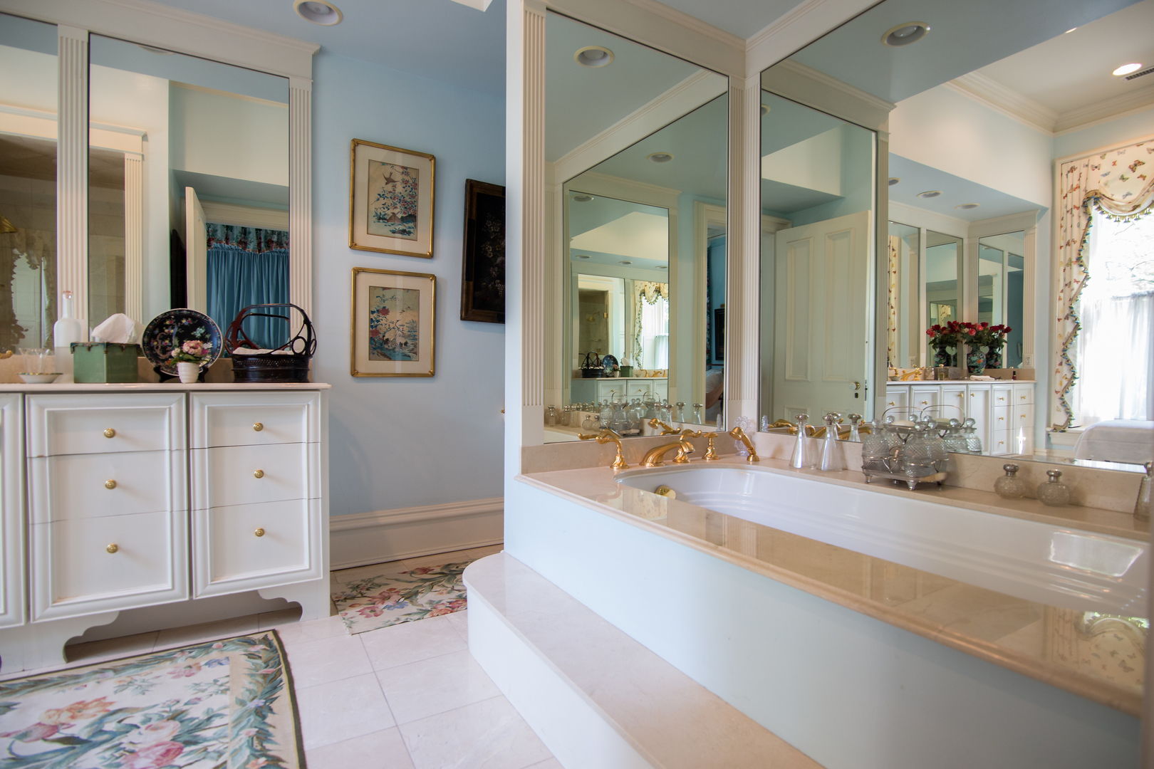 404 East Deerpath Road Lake Forest, IL 60045 - Photo 23 of 44 a spacious bathroom with a double vanity sink a mirror and shower