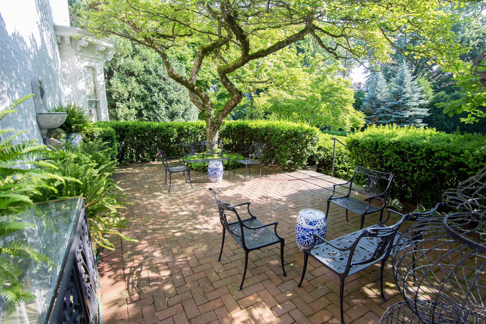 404 East Deerpath Road Lake Forest, IL 60045 - Photo 40 of 44 a view of a patio with table and chairs and potted plants