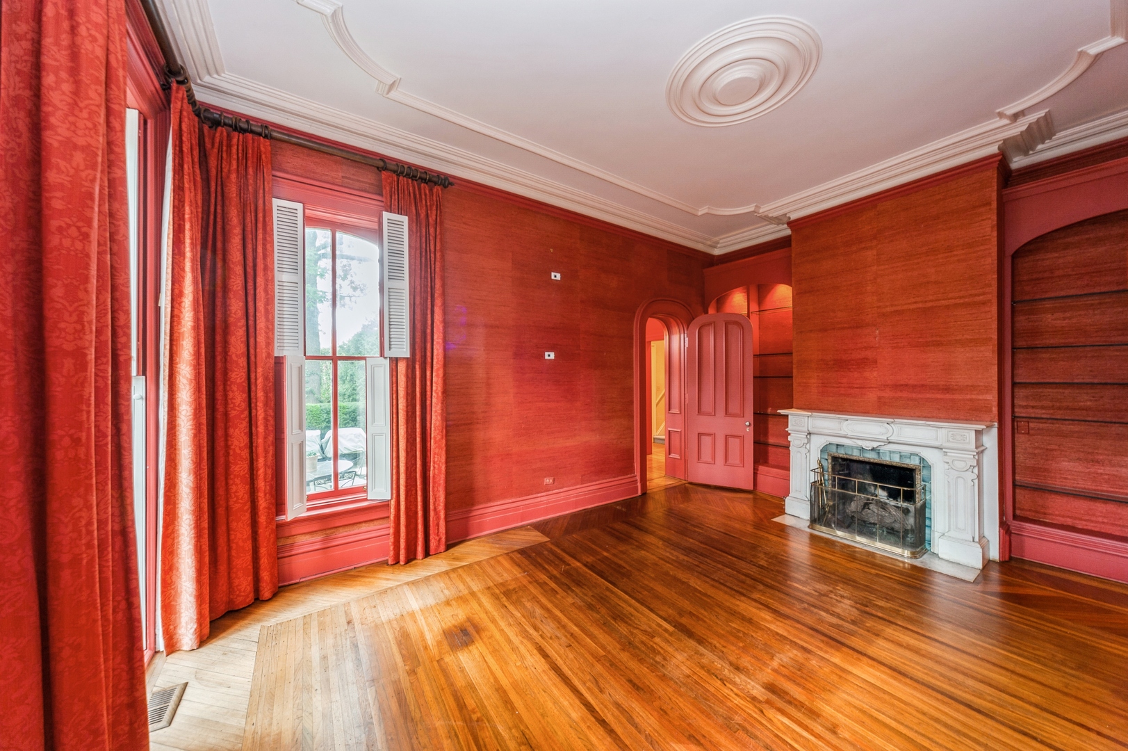 404 East Deerpath Road Lake Forest, IL 60045 - Photo 5 of 44 a view of empty room with wooden floor and fireplace