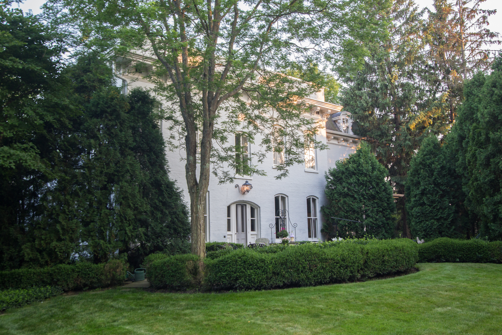 404 East Deerpath Road Lake Forest, IL 60045 - Photo 43 of 44 a view of a white house with a big yard and large trees