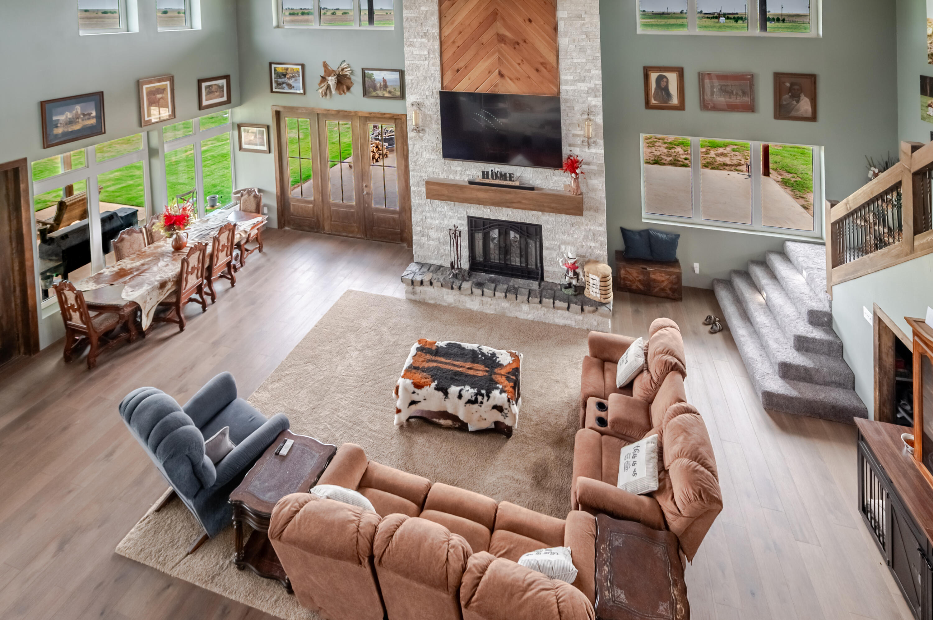 6792 Maine Road Anton, TX 79313 - Photo 42 of 77 a living room with furniture and a flat screen tv