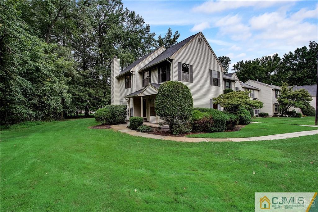 901 Timber Oaks Road Edison, NJ 08820 - Photo 2 of 27 a view of a house with backyard and garden