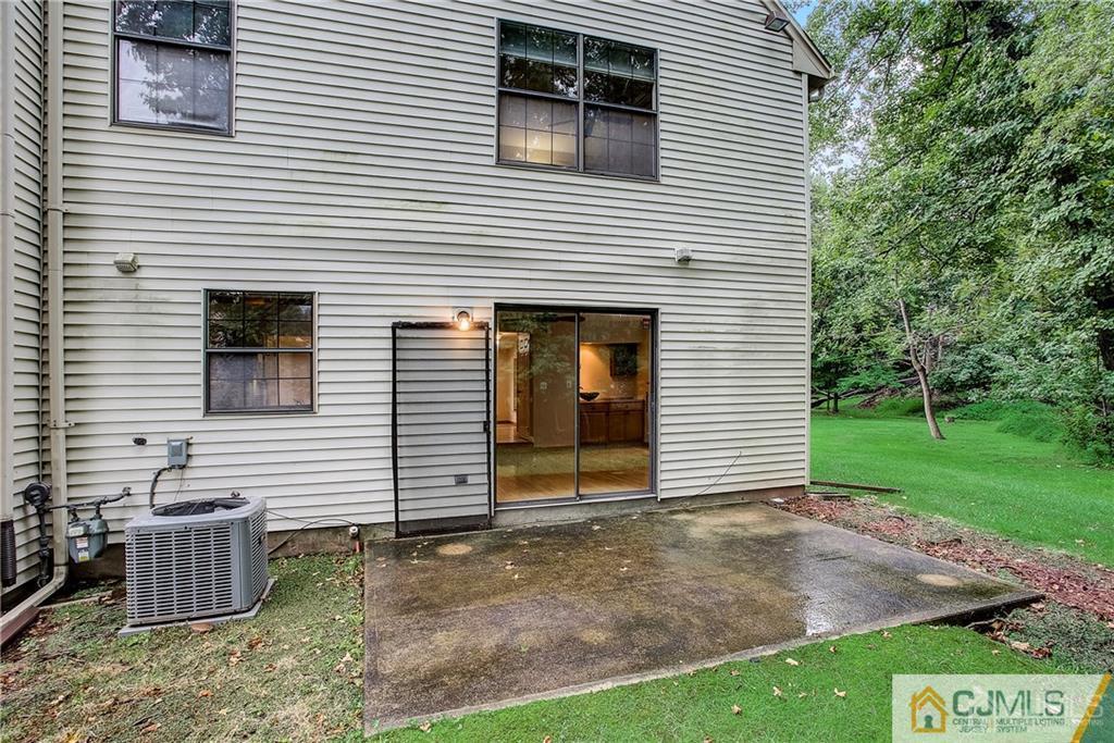 901 Timber Oaks Road Edison, NJ 08820 - Photo 27 of 27 a view of a house with a yard and garage