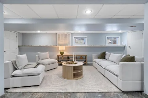 a living room with furniture and a couch