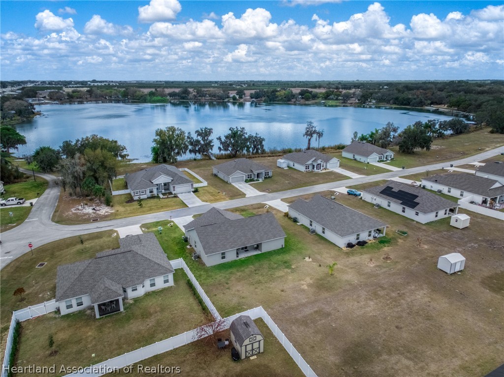 1204 Ridge Drive Avon Park, FL 33825 - Photo 17 of 20 an aerial view of a house with a lake view