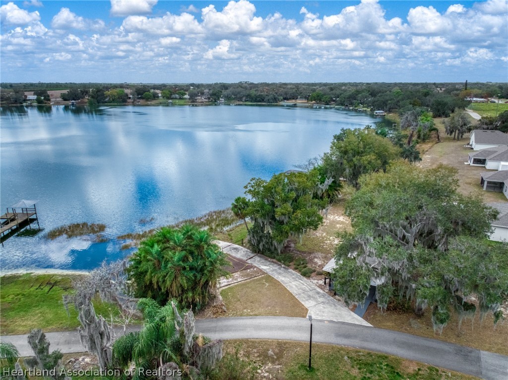 1204 Ridge Drive Avon Park, FL 33825 - Photo 3 of 20 a view of a lake from a yard