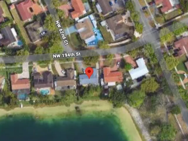 a sign that is on a brick building