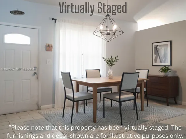 a view of a dining room with furniture