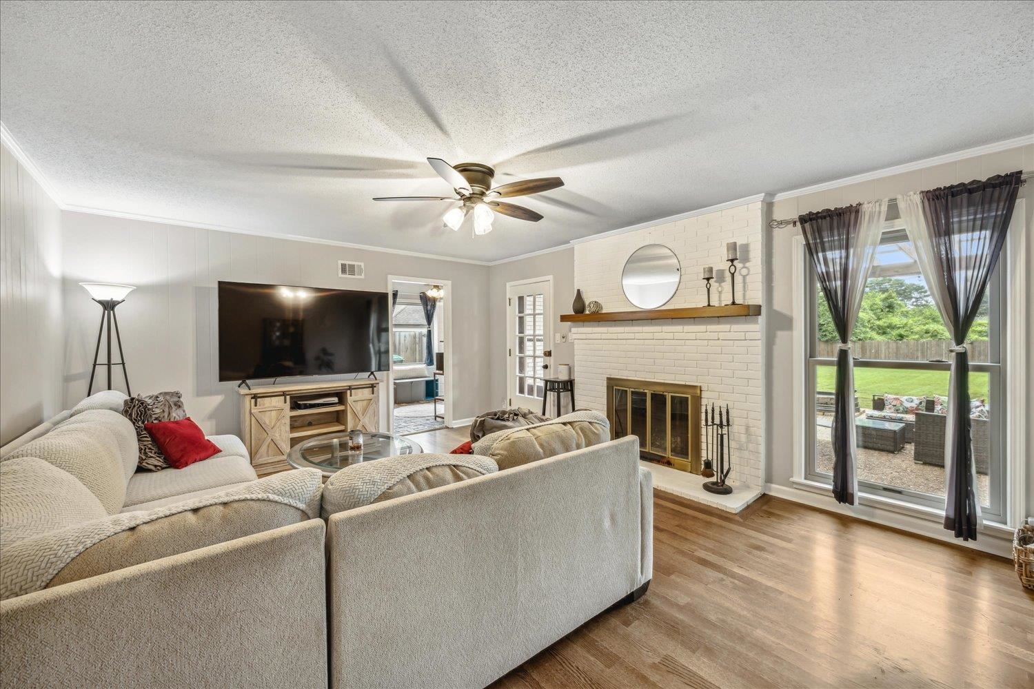 2397 Lynnfield Road Memphis, TN 38119 - Photo 14 of 28 a living room with furniture and a flat screen tv